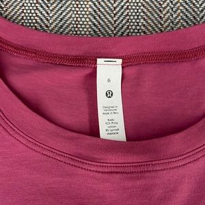 Pink Lululemon cropped t shirt.